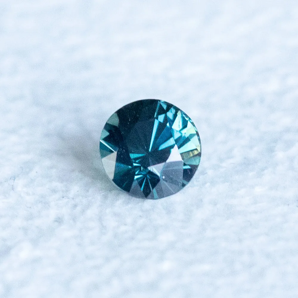 0.85CT ROUND DEEP TEAL BLUE MADAGASCAR SAPPHIRE, 5.24X5.17X4.10MM, UNTREATED